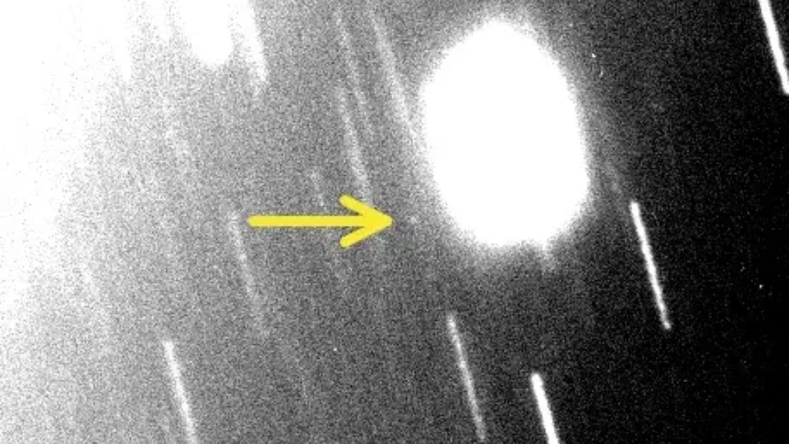 The new moon is a the small bright spot you see in the image where the yellow arrow is pointed.