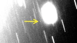 The new moon is a the small bright spot you see in the image where the yellow arrow is pointed.