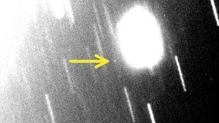 The new moon is a the small bright spot you see in the image where the yellow arrow is pointed.