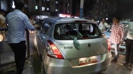 The car which was carrying journalist Nikhil Wagle and others after the attack in Pune. (Express Photo by Pavan Khengre)