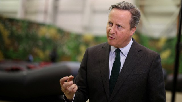 UK's Cameron says Putin should be held accountable for Navalny's death