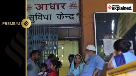 Applicants wait outside the Aadhaar Assistance centre at the Pragati Maidan in the capital New Delhi on Thursday. Earlier today, the Supreme Court came out with the final verdict doing away with the government's made requisition of aadhar connecting with Bank accounts and various government schemes.