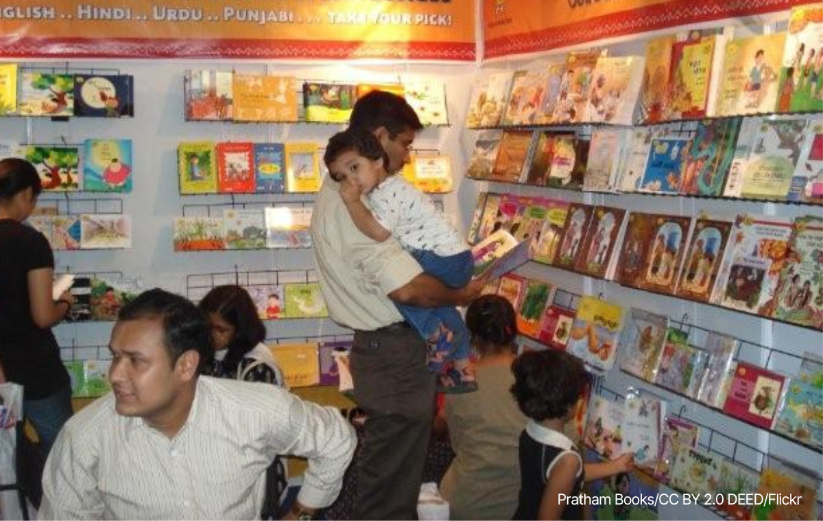 child held by father at delhi book fair in 2009