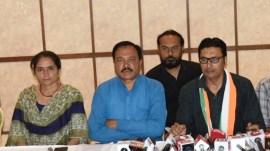 Komal Bharai (extreme left) and Vashram Sagathiya (second from left) address a press conference with Atul Rajani (extreme right), president of Rajkot city unit of Congress, in Rajkot on Tuesday. Express photo