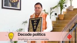 Uttarakhand Chief Minister Pushkar Singh Dhami leaves from his residence with a copy of the Constitution, in Dehradun, Tuesday, Feb. 6, 2024. The Uniform Civil Code Bill will be introduced in the Uttarakhand Assembly later today. (PTI