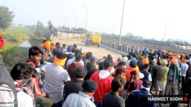 The shelling took place around 2 pm Friday noon when some youth set jute cloth on fire and tried to fling it towards the barricades. (Express Photo by Harmeet Sodhi)