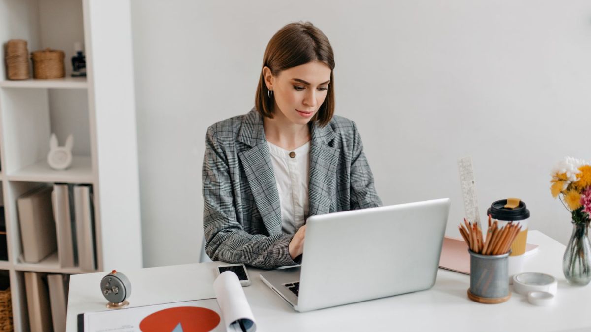 woman working on Google gemini on her laptop
