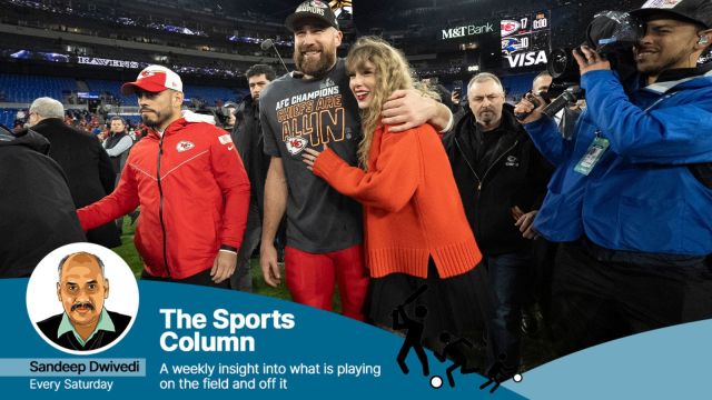 Kansas City Chiefs tight end Travis Kelce walks with Taylor Swift following the AFC Championship NFL football game between the Baltimore Ravens and the Kansas City Chiefs in Baltimore. (AP)