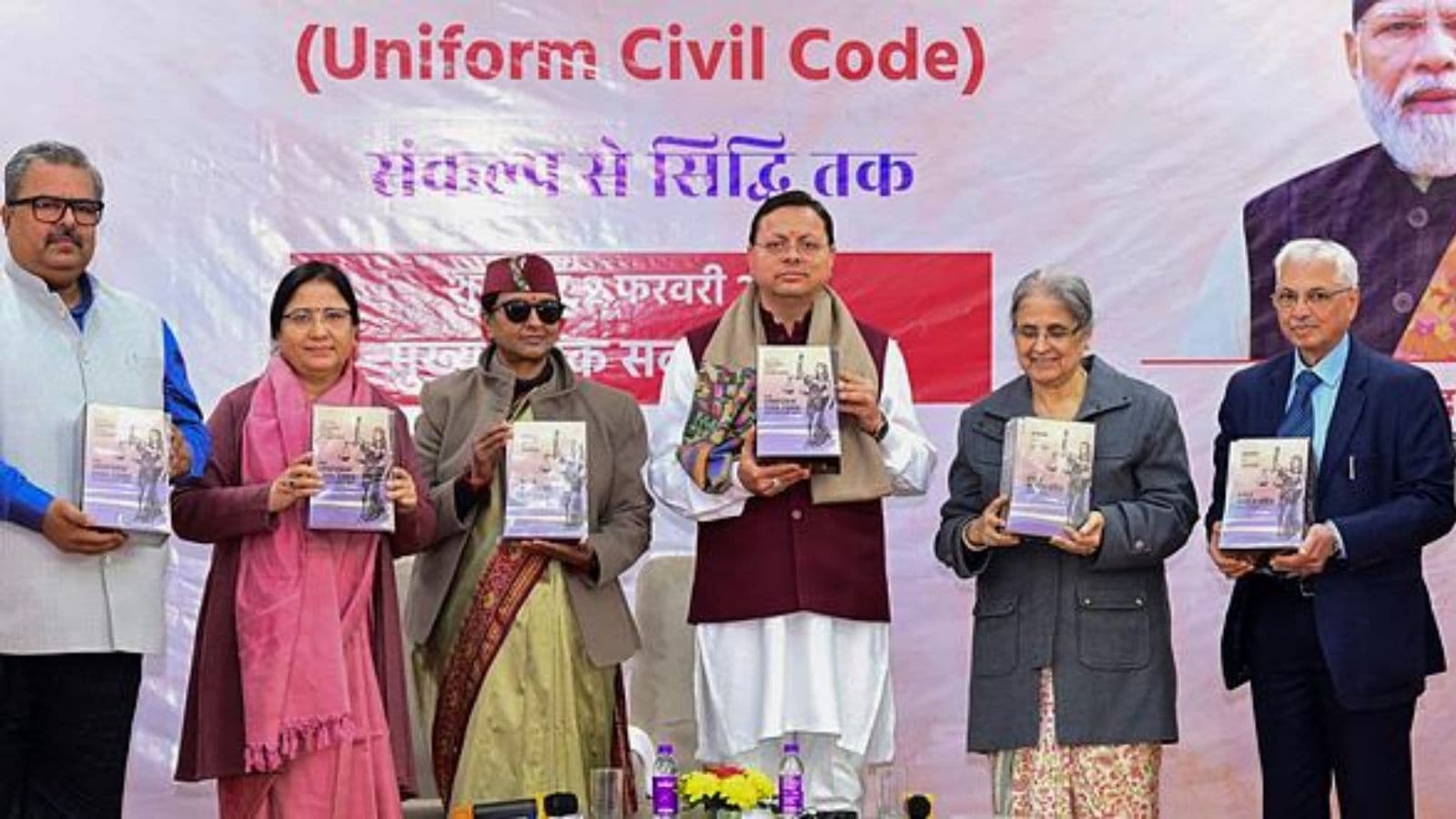 Uttarakhand Chief Minister Pushkar Singh Dhami with retired Supreme Court judge Ranjana Prakash Desai and others at Chief Sevak Sadan. (PTI Photo)
