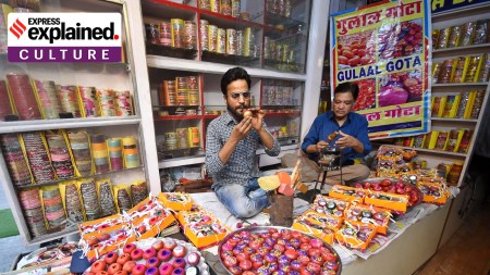 Artisan Amzed Khan gives final touches to a Gulaal Gota ahead of Holi in Jaipur, shaping it with a 'phunkni'. Used in the Hindu festival, they have always been made by Muslim artisans in the city.