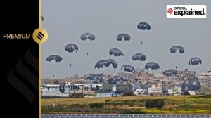 Humanitarian aid falls through the sky towards the Gaza Strip after being dropped from an aircraft, amid the ongoing conflict between Israel and the Palestinian Islamist group Hamas, as seen from Israel's border with Gaza, in southern Israel, March 17, 2024.