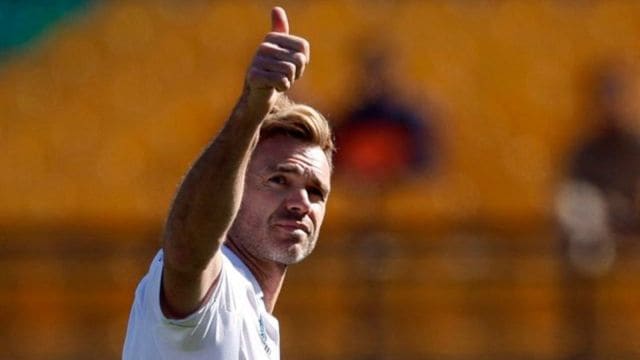 England's James Anderson acknowledges the crowd after taking his 700th Test wicket following the dismissal of India's Kuldeep Yadav, caught out by Ben Foakes