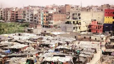 Jahan jhuggi, wahan makan, Delhi slums, Delhi slum redevelopment project, delhi slums rehabilitation programme, delhi Yamuna area, slums near yamuna, Delhi Development Authority, DDA demolition drive, Delhi LG V K Saxena, special economic zone, indian express news