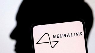 Neuralink logo and Elon Musk silhouette are seen in this illustration taken, December 19, 2022. REUTERS/Dado Ruvic/Illustration/File Photo