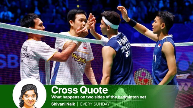 Indonesia's Fajar Alfian and Muhammad Rian Ardianto shake hands with Indonesia's Mohammad Ahsan and Hendra Setiawan after winning the men's doubles final in All England Open Badminton Championships in 2023 (Reuters)