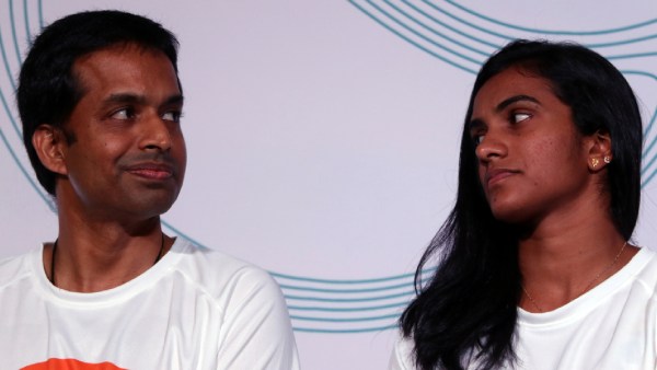 Pullela Gopichand with PV Sindhu at an event in Mumbai in 2016. Express Photo by Prashant Nadkar