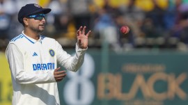 India's Kuldeep Yadav during the first day of the fifth Test cricket match between India and England, in Dharamshala