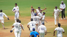 Mumbai players celebrate as Dhawal Kulkarni takes the wicket of Vidarbha's Umesh Yadav to win the Ranji Trophy final test cricket match between Mumbai and Vidarbha, at the Wankhede Stadium, in Mumbai. (PTI)