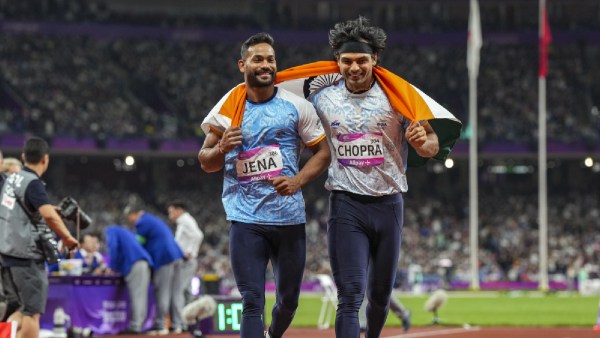 Neeraj Chopra and Kishore Kumar Jena celebrate after securing gold and silver medal respectively in the Men's Javelin Throw Final event at the 19th Asian Games held in Hangzhou, China in October 2023. (PTI file)