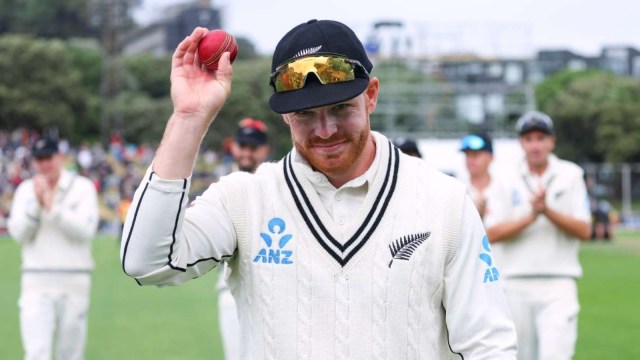 Glenn Phillips leads his team back to the dressing-room after bagging his maiden Test five-for against Australia.