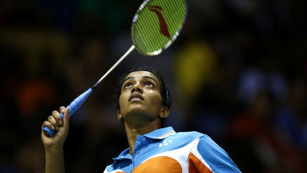 PV Sindhu of India celebrates a point at the women's single semi final match against Sayaka Takahashi of Japan during the Thomas and Uber cup final 2014, at Siri fort sports complex, in New Delhi on 23rd 2014. Express photo by Ravi Kanojia.