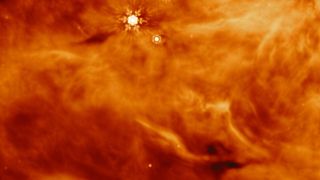 Gas, dust and ices swirling around the protostar protostar IRAS23385. (ESA)