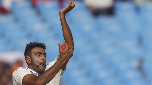 India's Ravichandran Ashwin bowls a delivery on the fourth day of the third test cricket match between India and England, at the Niranjan Shah Stadium, in Rajkot, Sunday, Feb. 18, 2024. (PTI Photo)