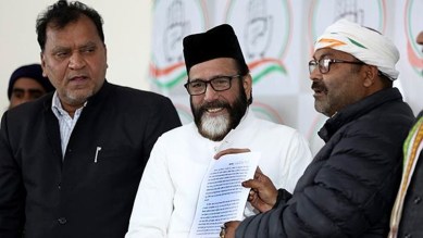 Maulana Tauqeer Raza Khan, NBW against taugeer raza, non bailable warrant, NBW pasted on raza house, Ittehade-e-Millat Council, 2010 Bareilly riot case, indian express news