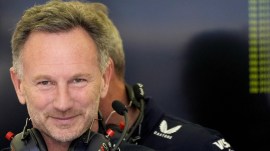 Red Bull team principal Christian Horner stands in his team garage during the third practice session ahead of the Formula One Bahrain Grand Prix at the Bahrain International Circuit in Sakhir, Bahrain, Friday, March 1, 2024. (AP Photo)