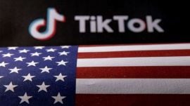 U.S. flag and TikTok logo are seen in this illustration taken, June 2, 2023. REUTERS/Dado Ruvic/Illustration/File Photo