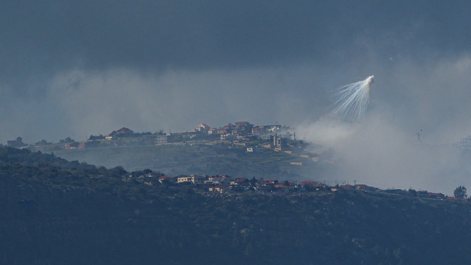 The Israeli army uses white phosphorus to create a smoke screen in Lebanon, as seen from Israel’s border with Lebanon in northern Israel
