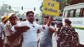 delhi Arvind Kejriwal arrest, Lok Sabha elections 2024, delhi streets, Kejriwal arrest posters, delhi cm arrest, arvind kejriwal ed custody, aaps protest, delhi aap protest, delhi police, indian express news