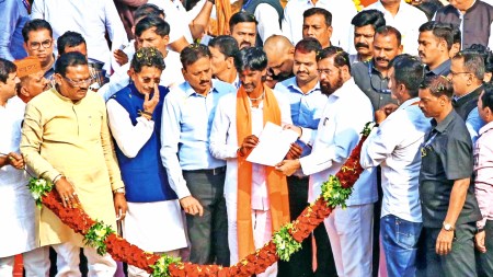 Maratha quota activist Manoj Jarange-Patil with CM Eknath Shinde in Vashi in January this year. Express file