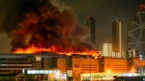 A massive blaze is seen over the Crocus City Hall on the western edge of Moscow, Russia, Friday, March 22, 2024. Several gunmen have burst into a big concert hall in Moscow and fired automatic weapons at the crowd, injuring an unspecified number of people and setting a massive blaze in an apparent terror attack days after President Vladimir Putin cemented his grip on the country in a highly orchestrated electoral landslide. (Sergei Vedyashkin/Moscow News Agency via AP)