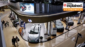 Electric vehicles are displayed at a shopping mall in Beijing, China.