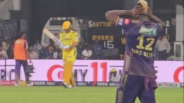 Kolkata Knight Riders all-rounder Andre Russell covers his ears the moment Chennai Super KIngs' MS Dhoni walked out to bat at Chepauk on Monday.