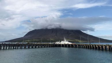 Indonesians leave homes near erupting volcano and airport closes due to ash danger Manado
