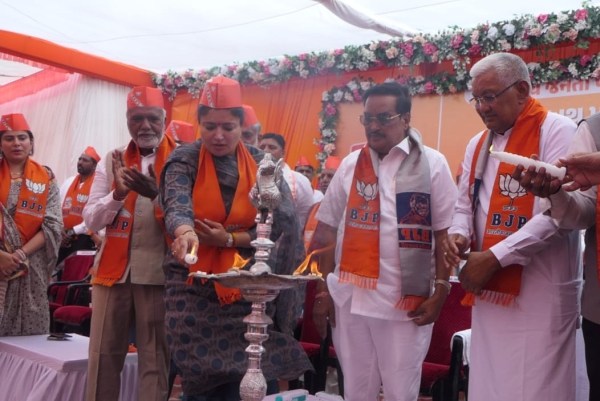 CR Paatil (second from right) looks on as sitting BJP MP from Jamnagar, Poonam Maadam lights the ceremonial lamp at the BJP meeting in Jamnagar on Friday. Express photo 