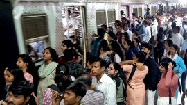 Passengers at the Dadar railway station on Monday. Deepak Joshi Ridership in suburban trains 8.9% lower than pre-pandemic levels.