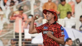 ALT Text: IPL Match Today: Sunrisers Hyderabad's Pat Cummins takes the catch of Gujarat Titans' Wriddhiman Saha during the Indian Premier League (IPL) 2024 T20 cricket match between Sunrisers Hyderabad and Gujarat Titans, at Narendra Modi Stadium, in Ahmedabad, Sunday, (PTI)