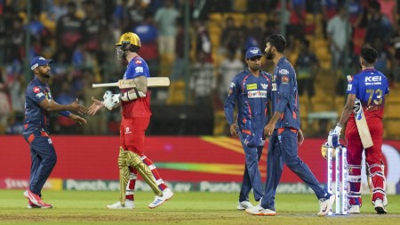 Lucknow Super Giants' players being congratulated by Royal Challengers Bengaluru’s Reece Topley and Mohammed Siraj after winning the Indian Premier League (IPL) 2024 T20 cricket match between Royal Challengers Bengaluru and Lucknow Super Giants, at M Chinnaswamy Stadium, in Bengaluru.