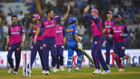 Rajasthan Royals bowler Trent Boult with teammates celebrates the wicket of Mumbai Indians batter Naman Dhir during the Indian Premier League 2024 match between Mumbai Indians and Rajasthan Royals, at Wankhede Stadium in Mumbai