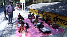 Teacher Gaurav (left) has been teaching at the Bal Sanskar Kendra in Dhaula Kuan, New Delhi, for a year. (Express Photo by Renuka Puri)