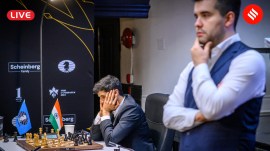 Chess Candidates 2024 Round 4 live updates: Vidit Gujrathi contemplates his next move in the game against Ian Nepomniachtchi (right). (PHOTO: FIDE/ Michal Walusza)
