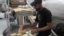 Aid brings a Gaza bakery back to life