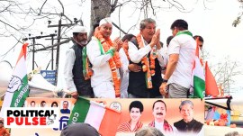 Former CM Harish Rawat with his son Virendra Rawat. (Express Photo)