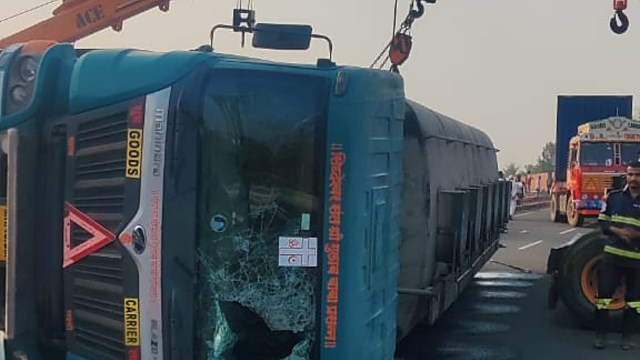 The incident created a traffic jam on the highway from 3.45 am until the vehicle was cleared using a crane, the police said. (Express Photo)