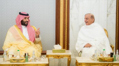 Saudi Crown Prince Mohammed bin Salman meets Pakistan's Prime Minister Shehbaz Sharif in his palace on the eve of 29th Ramadan in the holy city of Mecca, Saudi Arabia, April 7, 2024. (Saudi Press Agency/Handout via Reuters)
