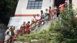 Voters stand in queues to cast their vote during the second phase Bengal voter turnout