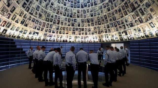 Visitors tour an exhibition, ahead of Israel's national Holocaust memorial day at Yad Vashem, the World Holocaust Remembrance Center, in Jerusalem. (Reuters Photo)